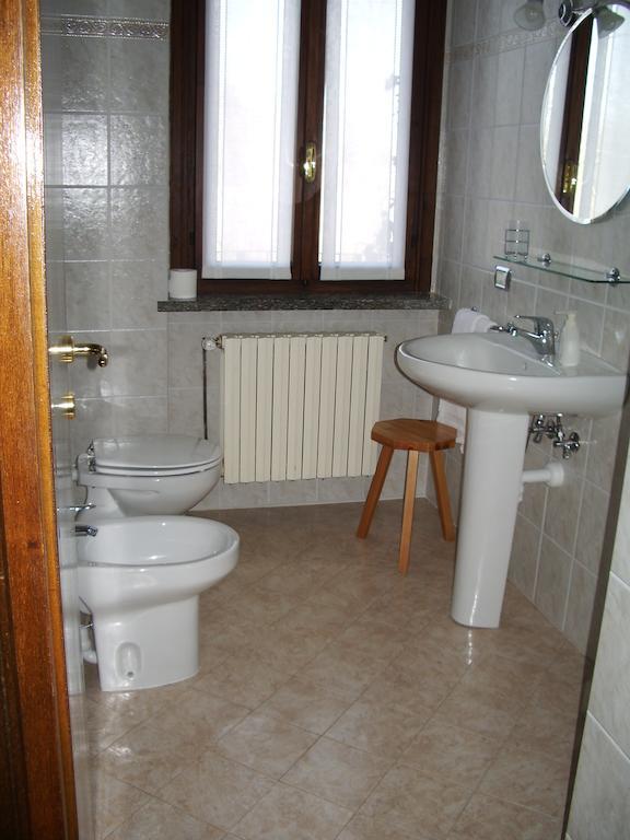 Agriturismo Fano'S Farm Suno Chambre photo